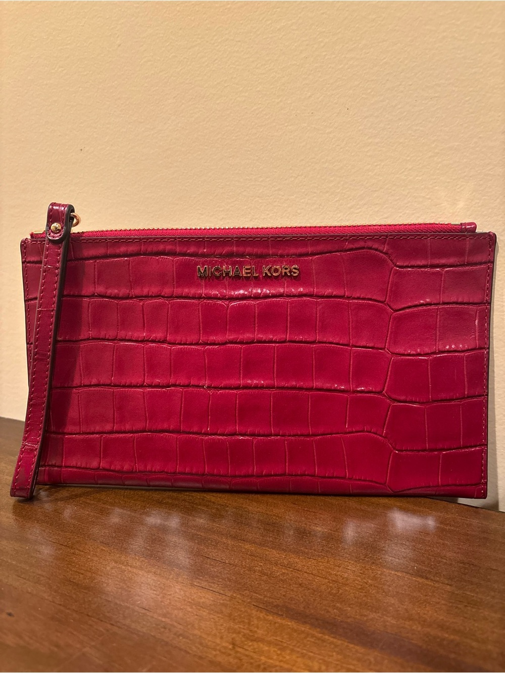Michael Kors Croc-Embossed Wristlet in Magenta